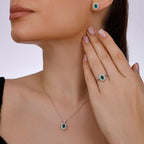 1.18 Carat Emerald and Diamond Halo Earrings