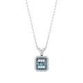 White gold necklace with emerald-cut blue and white diamond halo pendant