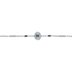 Elegant bracelet with oval deep blue stones and sparkling white accents on silver chain